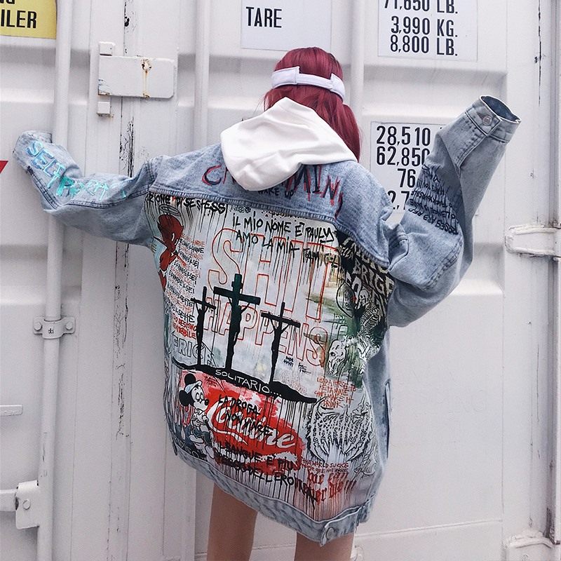 Graffiti painted old denim jacket coat